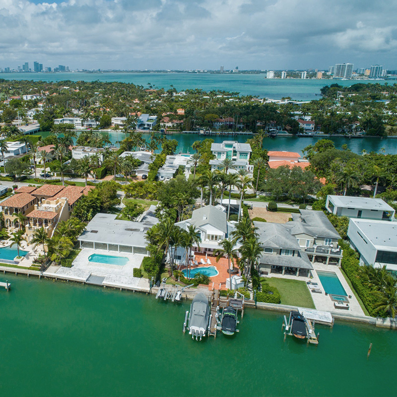 Aerial view of luxury waterfront homes in Miami.